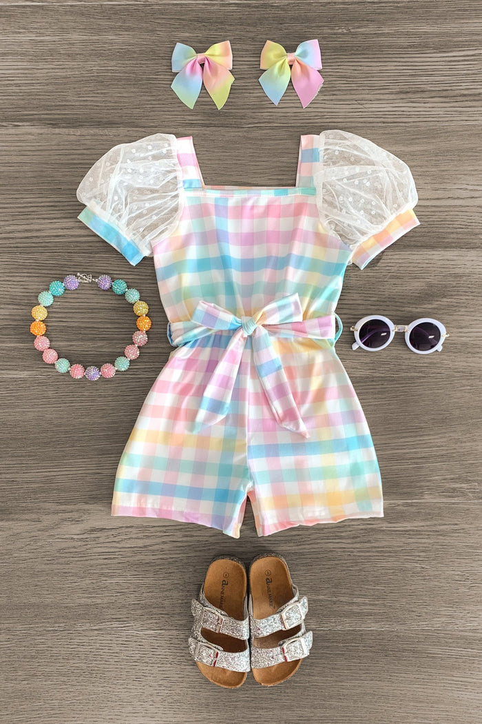 Pastel Rainbow Plaid Romper - 6-12 Months - Pastel rainbow plaid romper with puff lace sleeves and waist tie, paired with bow clips, beaded bracelet, sunglasses, and.