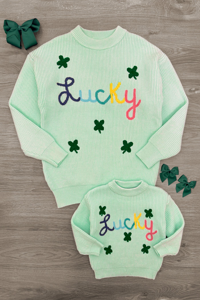 Mom & Me - "Lucky" Mint Knit Sweater - CHILD-3XS-6-12 Months - Mint green knit sweaters with colorful "Lucky" text and small dark green shamrock accents for mom and child.