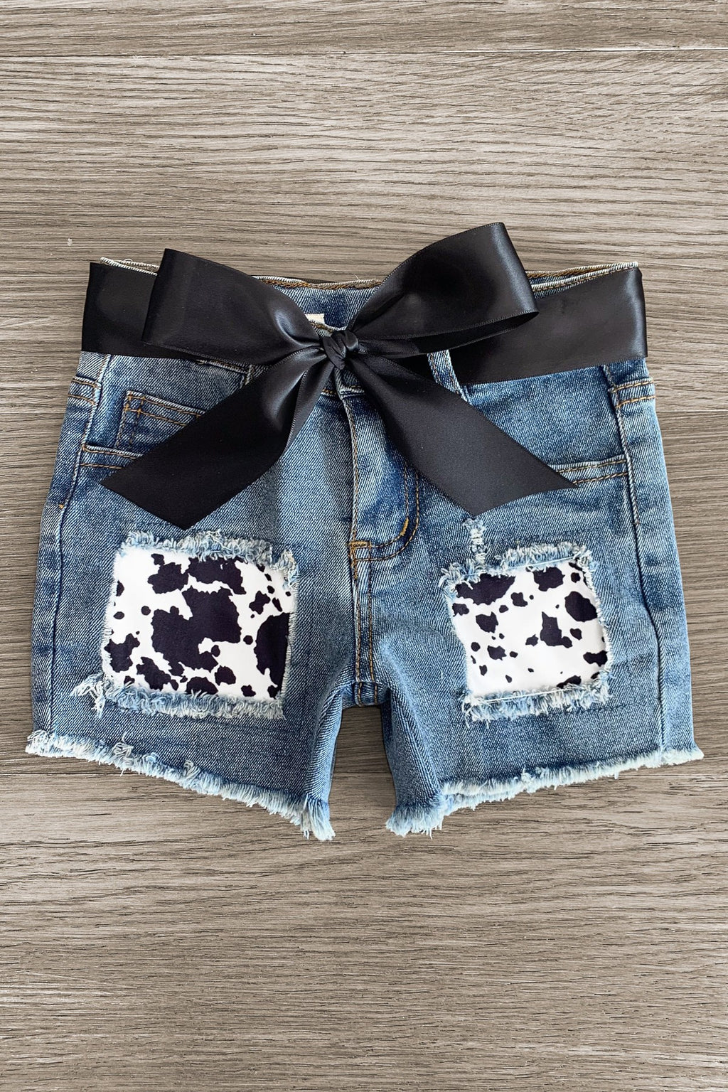 "Moody" Cow Print Denim Short Set - Sparkle in Pink