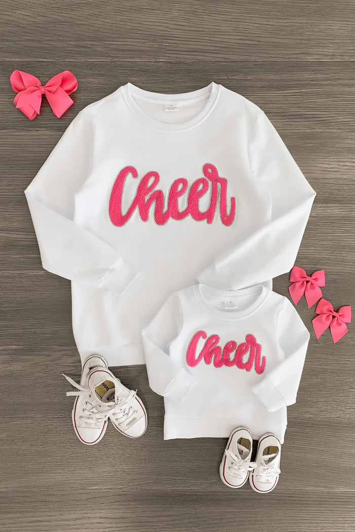 Mom & Me - "Cheer" Chenille Patch Long Sleeve Top - CHILD-3XS-6-12 Months - White long sleeve tops with pink chenille "Cheer" patch, matching pink bows, and white sneakers.