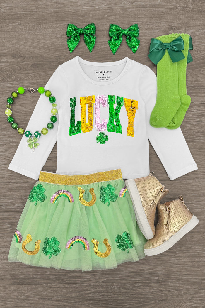 "Lucky" Sequin Charms Skirt Set - 6-12 Months - Toddler "Lucky" skirt set with green sequin charms, white long-sleeve top, green bow socks, matching hair bows, beaded.