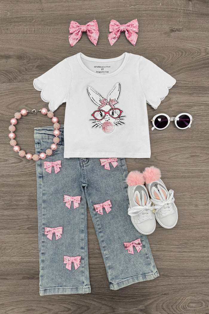 Bunny & Bows Sequin Denim Pant Set - 6-12 Months - White short-sleeve shirt with bunny wearing red glasses, paired with light denim pants featuring pink sequin bows and.