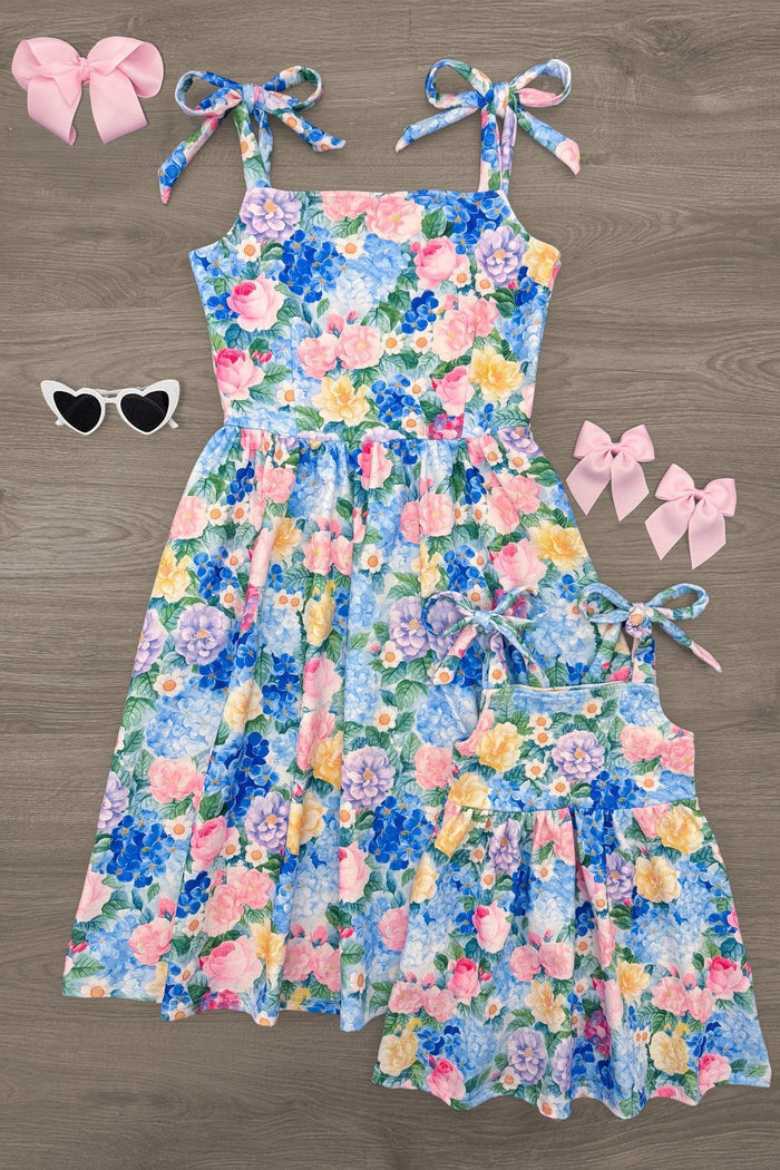 Mom & Me - Floral Watercolor Tank Dress - CHILD-6-12 Months - Matching blue floral watercolor tank dresses for mom and child with pink bows and white sunglasses accessories.