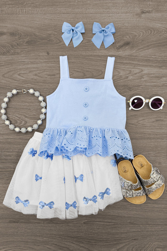 Blue Bow Tutu Skirt Set - 6-12 Months - White sleeveless top with blue lace trim paired with white skirt featuring blue bows, matching blue bow hair clips, round.