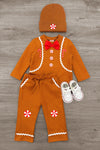 Gingerbread Man Costume - 6-12 Months - Orange gingerbread man costume with white icing trim, red bow tie, candy buttons, matching hat, and white baby shoes.
