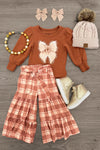 "Grateful, Blessed, Thankful" Plaid Pant Set - 6-12 Months - Rust long-sleeve top with a bow graphic and plaid wide-leg pants, styled with a matching bow clip.