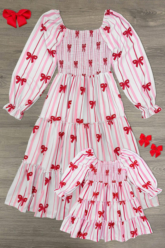 Mom & Me - Pink Bow Striped Dress - CHILD-3XS-6-12 Months - Pink and white striped dress with red bows, smocked bodice, long puff sleeves, and matching child dress with matching pink.