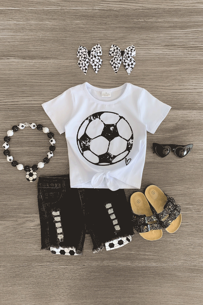 White Soccer Denim Short Set - 3XS-6-12 Months - White toddler t-shirt with black soccer ball print, black denim shorts with white soccer ball trim, spotted hair clips,.