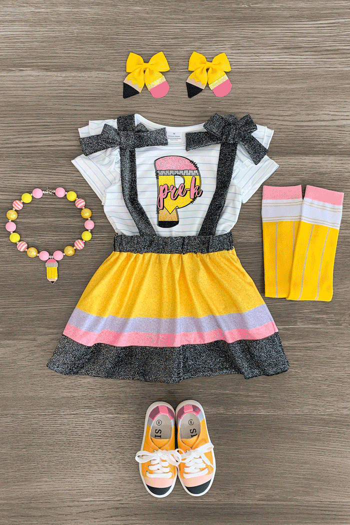 "Pre-K - Fifth Grade" Pencil Suspender Skirt Set - PRE-K / 2T - White and yellow striped pencil suspender skirt set with pink accents, striped socks, matching bows, beaded necklace, and.