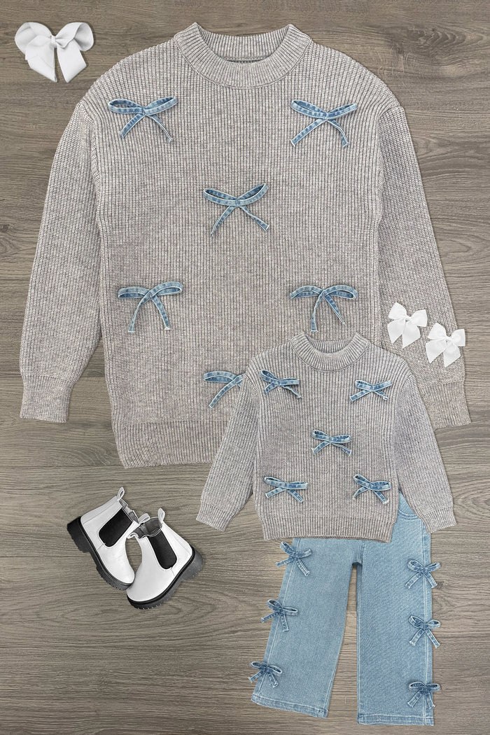 Mom & Me - Gray Bow Knit Sweater & Denim Pant Set - CHILD-3XS-6-12 Months - Gray knit sweater with blue bows paired with light denim pants featuring blue bows on the legs.