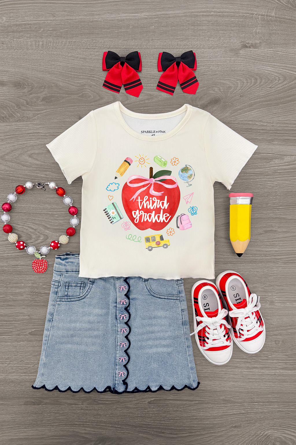 "Pre-K - Fifth Grade" Apple Denim Skirt Set - PRE-K / 2T - Cream short-sleeve tee with red apple graphic and denim skirt with scalloped hem and red stitching.