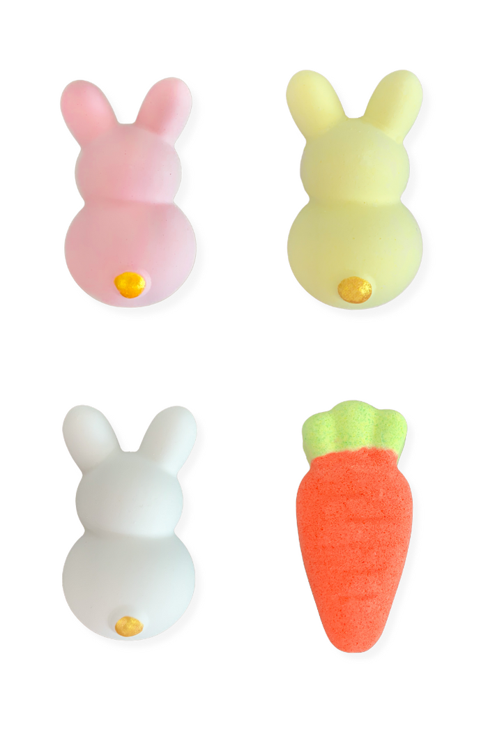 Easter Bunny Bath Bombs - Carrot - Pink, yellow, and white bunny-shaped bath bombs with a small orange nose, plus an orange carrot-shaped bath bomb.