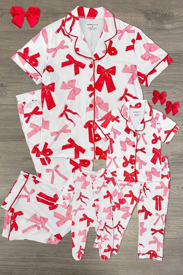 Mom & Me - Pink & Red Bow Pajamas - BABY-Newborn - Matching pink pajamas set with red bow prints, featuring short sleeves, buttons, and long-sleeve footed pants for child and.