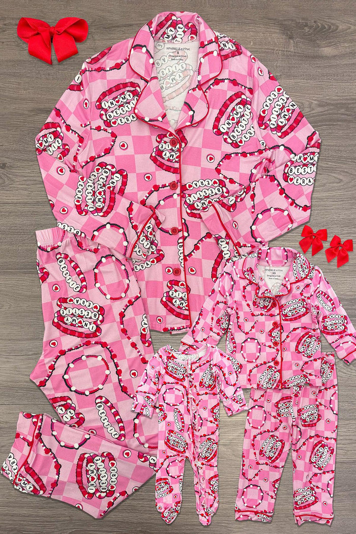 Mom & Me - Bamboo "In My Bestie Era" Bracelet Pajamas - BABY-Newborn-FAMILY - Pink bamboo pajamas set with candy and heart print, includes adult and two child sizes with buttons and footed pajamas, red.