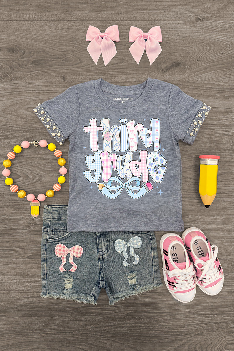 "Pre-K - Sixth Grade" Plaid Bow Denim Short Set - THIRD GRADE / 7 - Gray short-sleeve tee with plaid ruffle sleeves and "third grade" text paired with distressed denim shorts featuring pink.