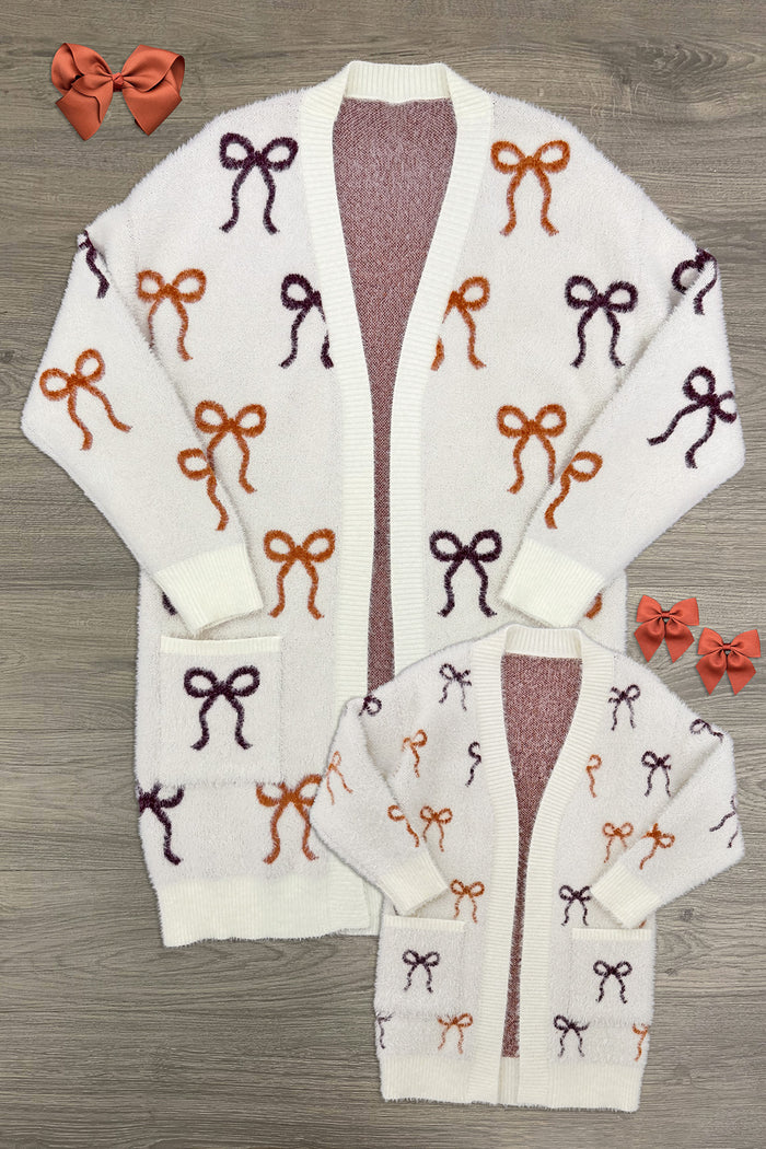 Mom & Me - Cozy Cream Bow Cardigan - CHILD-6-12 Months - Cream knit cardigan set with rust and burgundy bow patterns, cozy and soft texture.