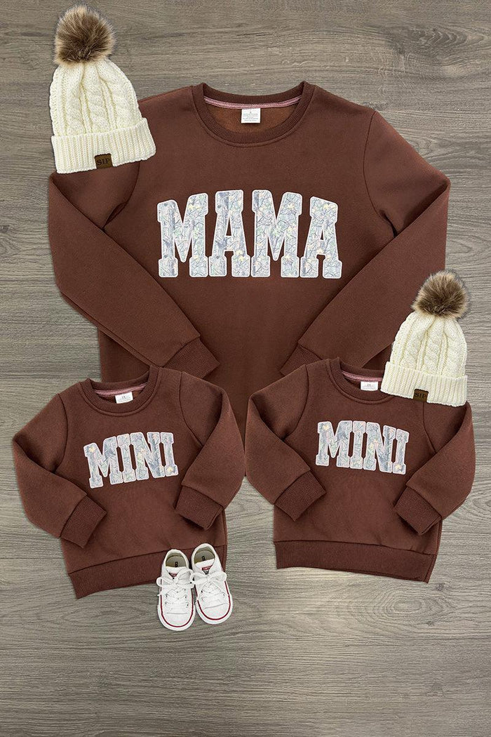 Mom & Kid - "Mama & Mini" Camo Sweatshirt - CHILD-6-12 Months - Brown cotton sweatshirts with white "MAMA" and "MINI" camo lettering, paired with cream knit hats with pom-poms and white.