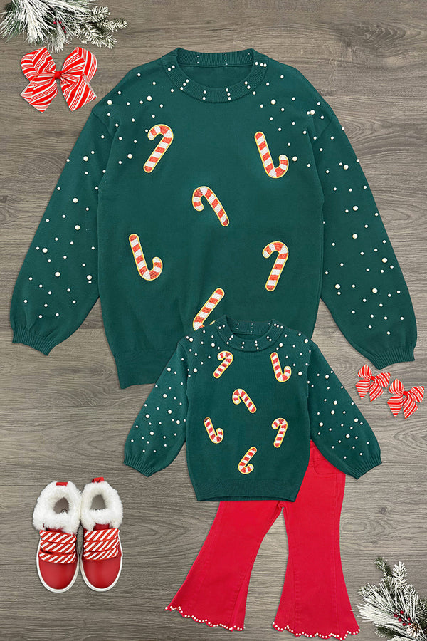 Mom & Me - Candy Cane Sweater & Denim Pant Set - CHILD-6-12 Months - Matching dark green sweaters with candy cane prints, styled with bright red flared pants and red shoes.