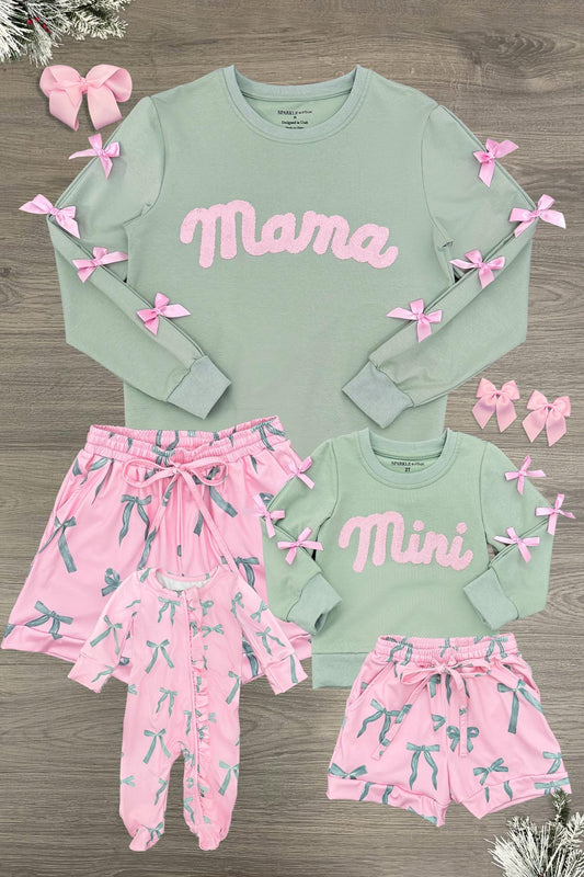 Mom & Me - "Mama & Mini" Pastel Bow Pajamas - CHILD-6-12 Months - Matching mint-green “Mama” and “Mini” pajamas with pink lettering and pastel bow-print pants and shorts.