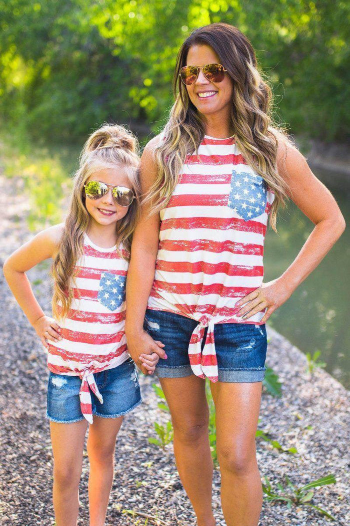 Mom & Me - Distressed Flag Tie Tank - CHILD-6-12 Months - Matching sleeveless red and white striped tie-front tanks with blue star pockets, worn by woman and young girl, paired with.