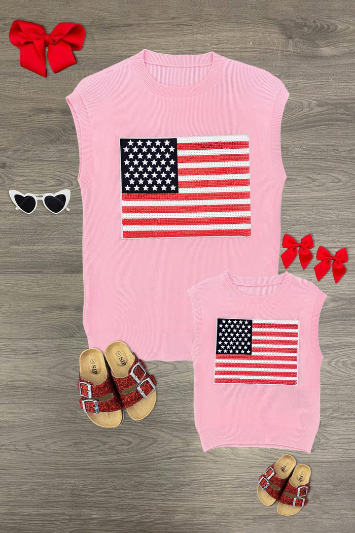 Mom & Me - Pink Flag Sweater Vest - CHILD-6-12 Months - Pink sleeveless sweater vests with American flag knit pattern, adult and child sizes, laid flat.