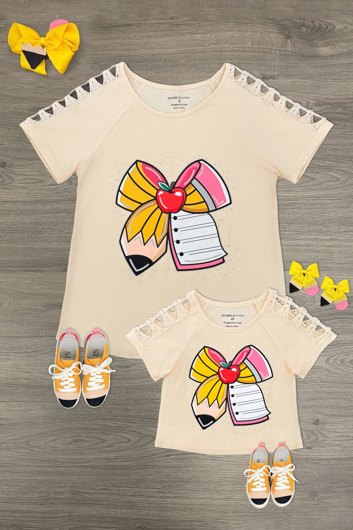 Mom & Me - Glitter Pencil & Paper Bow Top - CHILD-3T - Cream short-sleeve tops with glitter pencil and paper bow embroidery, matching yellow bows and toddler shoes.
