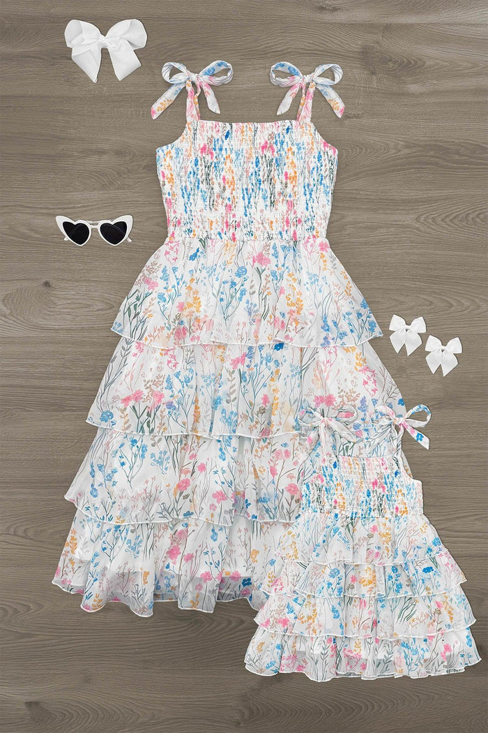 Mom & Me - Spring Floral Ruffle Dress - CHILD-6-12 Months - White spring dress with pastel floral print, ruffled tiers, and shoulder tie straps.