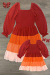 Mom & Me - Fall Ruffle Ombre Dress - CHILD-6-12 Months - Two matching fall ruffle dresses in rust, orange, pink, and cream ombre with smocked bodices and puffed long sleeves.