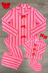 Mom & Me - Pink & Red Stripe Bow Pajamas - CHILD-6-12 Months - Pink pajama set with vertical red stripes, collared long-sleeve top, and matching pants, decorated with red bow accents on.