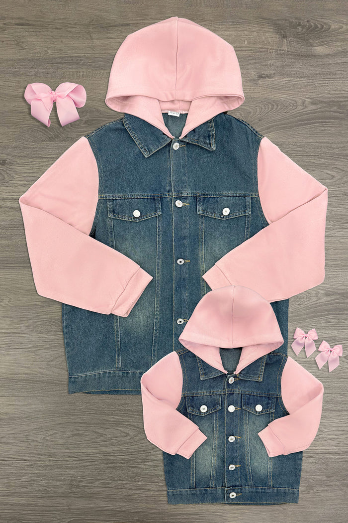 Mom & Me - Pink Hooded Denim Jacket - CHILD-6-12 Months - Pink hoodie with blue denim button-up body, designed as matching jackets for adult and child, laid flat on wooden floor.