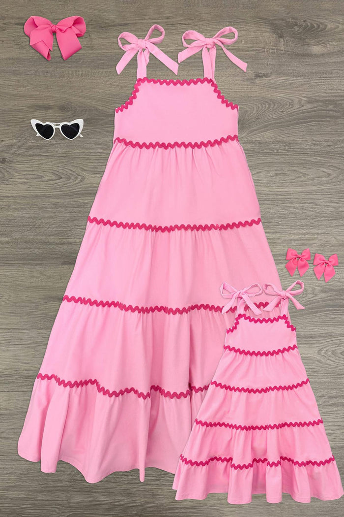 Mom & Me - Pink Ribbon Maxi Dress - CHILD-6-12 Months - Matching pink maxi dresses with tiered ruffles and dark pink trim, featuring bow tie shoulder straps for mom and child.