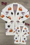 Mom & Me - Cozy Thanksgiving Cardigan - CHILD-6-12 Months - Cream knit cardigan with pumpkin pie and bow motifs, featuring large front pockets and button closure.