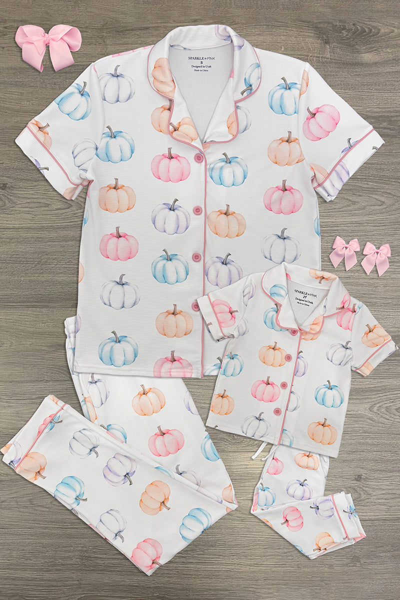 Mom & Me - Pastel Pumpkin Waffle Knit Pajamas - CHILD-6-12 Months - White waffle knit pajamas with pastel pumpkin prints in pink, orange, blue, and cream, featuring short sleeves on the.