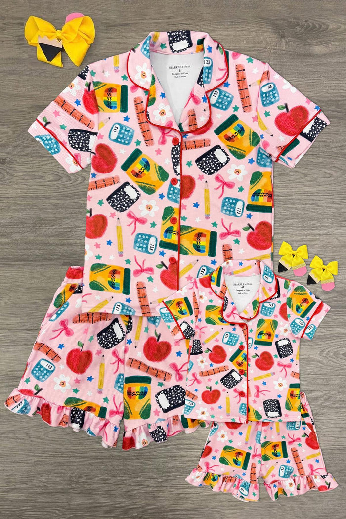 Mom & Me - School Supply Waffle Knit Pajamas - CHILD-3T - Matching pink waffle knit pajamas with colorful school supplies print, short sleeves and shorts, set with yellow hair bows.