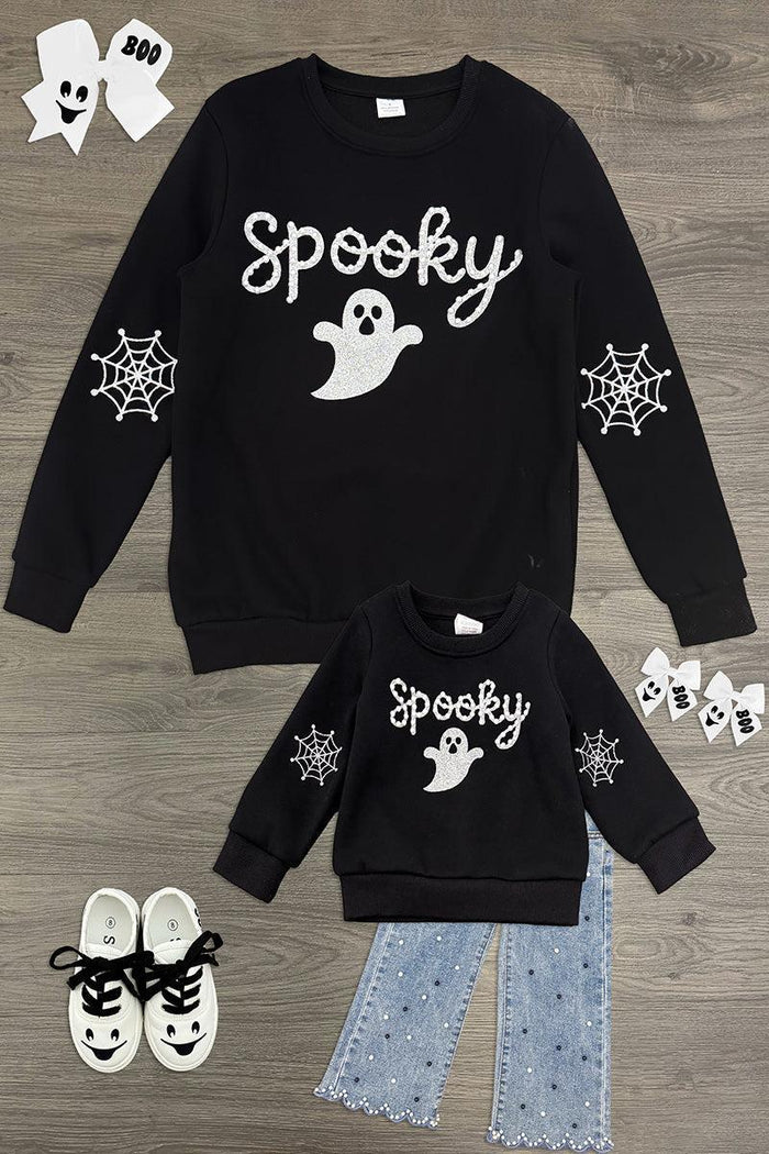 Mom & Me - "Spooky" Ghost Pullover & Denim Pant Set - CHILD-6-12 Months - Black pullover with white "spooky" text and ghost graphic, spider web prints on sleeves, paired with light blue denim pants.