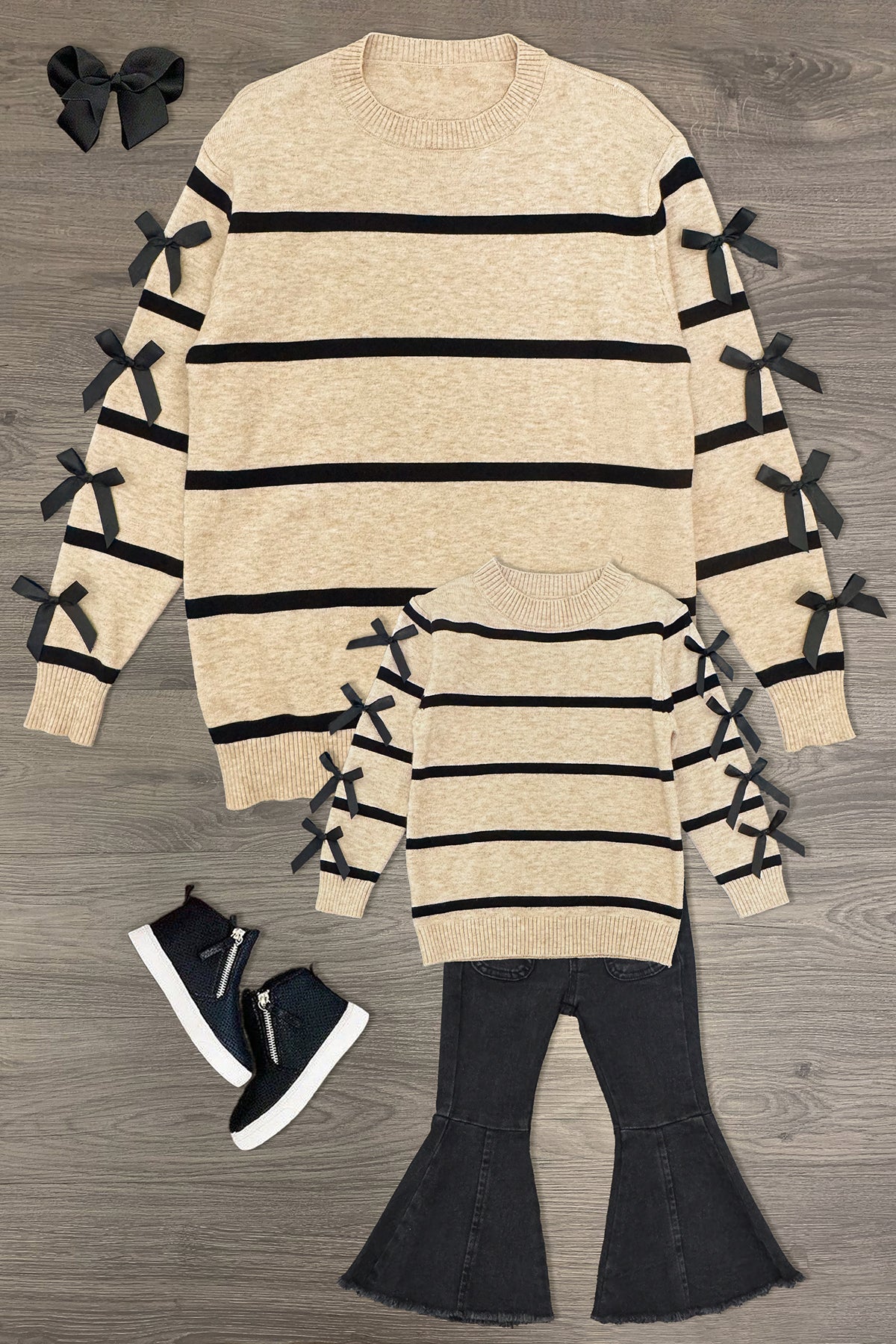 Mom & Me - Striped Bow Sweater & Denim Pant Set - CHILD-3XS-6-12 Months - Tan striped sweater with black bows on sleeves in adult and child sizes, paired with black sneakers and bow hair clips.