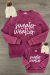 Mom & Me - "Sweater Weather" Acid Wash Pullover - CHILD-6-12 Months - Matching burgundy acid-wash pullovers with white “Sweater Weather” lettering, shown in adult and child sizes.