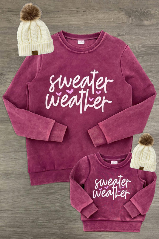 Mom & Me - "Sweater Weather" Acid Wash Pullover - CHILD-6-12 Months - Matching burgundy acid-wash pullovers with white “Sweater Weather” lettering, shown in adult and child sizes.