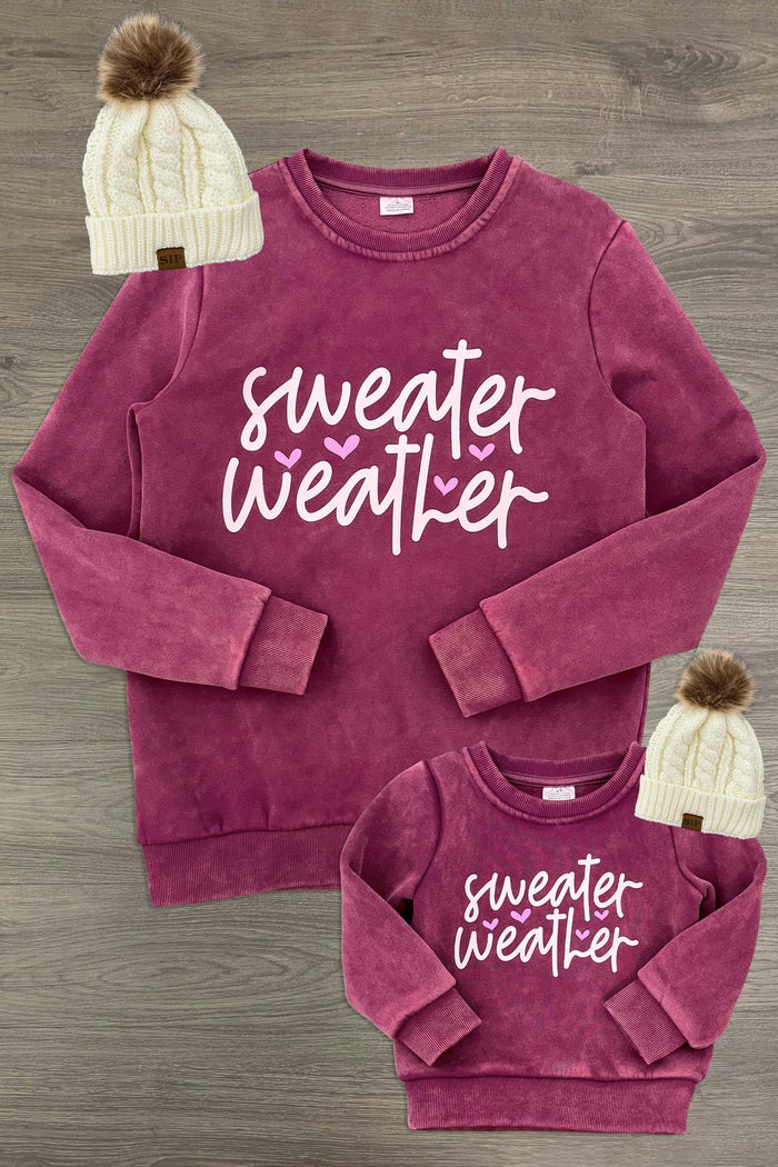 Mom & Me - "Sweater Weather" Acid Wash Pullover - CHILD-6-12 Months - Matching burgundy acid-wash pullovers with white “Sweater Weather” lettering, shown in adult and child sizes.