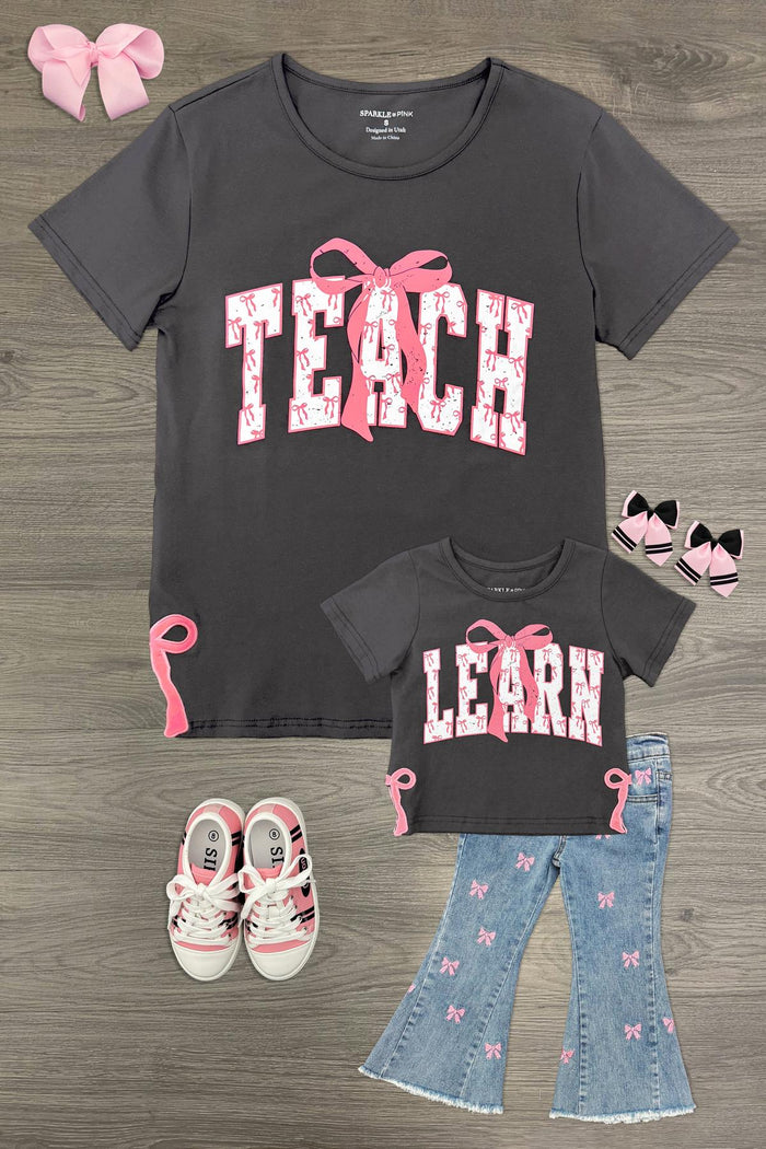 Mom & Me - "Teach & Learn" Pink Bow Top & Pant Set - 3T - Dark gray short-sleeve top with pink floral "TEACH" text and matching child’s pink floral "LEARN" top paired with blue.