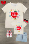 "Teach" Apple Top - MOM-XS - Cream short-sleeve top with red apple graphic and "teach" text surrounded by school-themed icons.