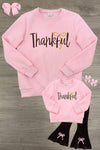 Mom & Me - "Thankful" Pink Pullover & Pant Set - CHILD-6-12 Months - Pink pullover and black pants set with "Thankful" text and yellow bow graphic on sweatshirts, matching pink bow hair.
