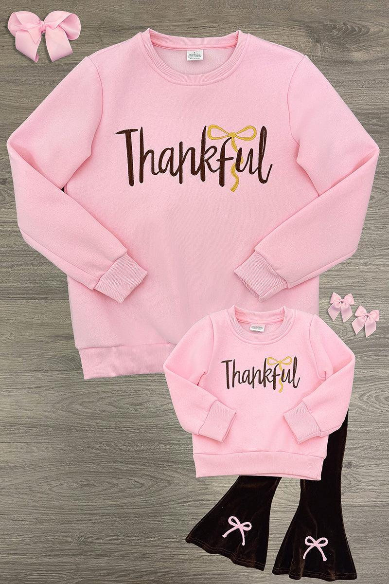 Mom & Me - "Thankful" Pink Pullover & Pant Set - CHILD-6-12 Months - Pink pullover and black pants set with "Thankful" text and yellow bow graphic on sweatshirts, matching pink bow hair.