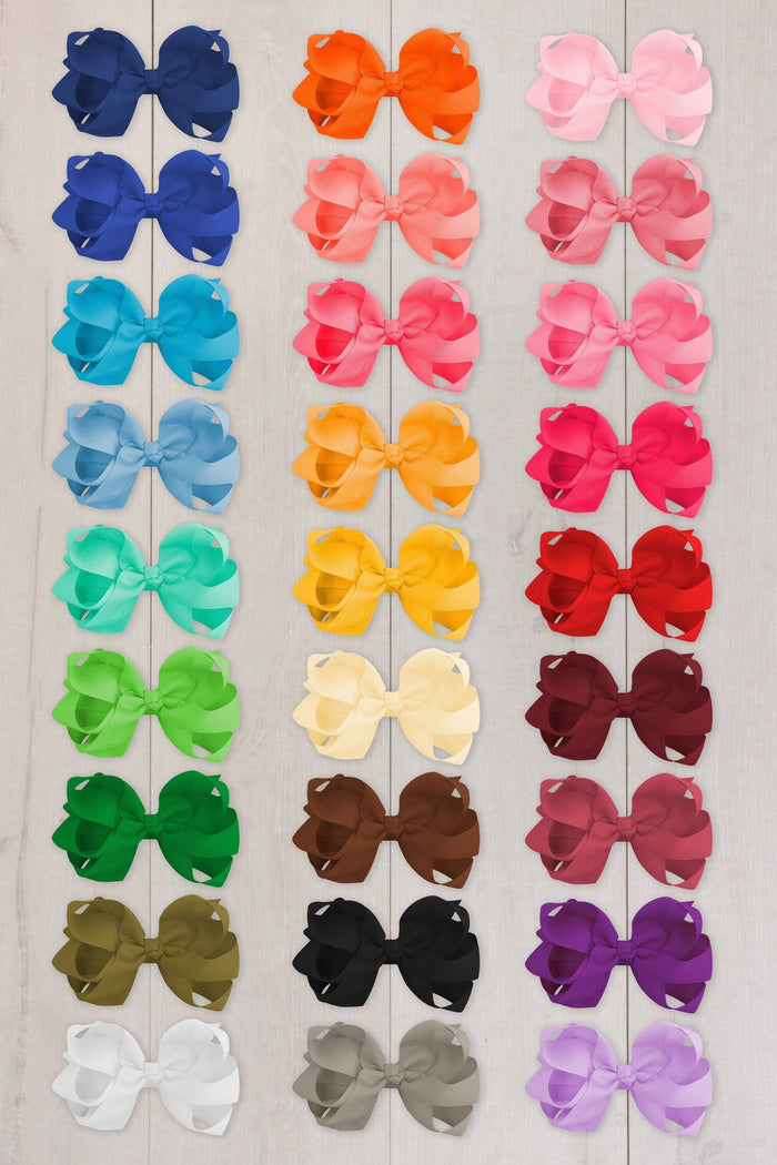 4" Chunky Double Loop Bows - Light Pink - Rows of 4" chunky double loop bows in navy, orange, light pink, hot pink, turquoise, yellow, mint, cream, brown, red,.