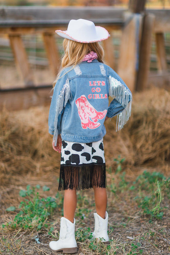 Let's Go Girls" Silver Fringe Denim Jacket - XXS-12-18 Months - Kids' light blue denim jacket with silver fringe and pink "Let's Go Girls" text and boot graphic on back.
