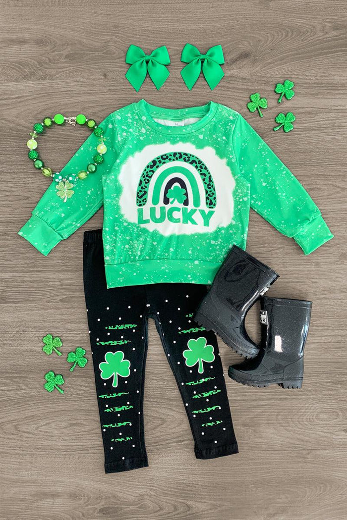 "Lucky" Green & Black Legging Set - 3XS-6-12 Months - Green long-sleeve shirt with rainbow and "Lucky" text paired with black leggings featuring green shamrocks and glitter.
