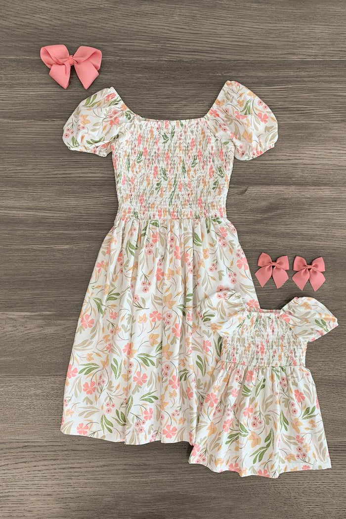 Mom & Me - White Smocked Floral Dress - CHILD-6-12 Months - White floral smocked dress with puff sleeves and gathered waist, includes matching pink bows.
