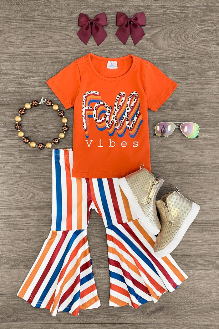 "Fall Vibes" Striped Bell Bottom Set - 3XS-6-12 Months - Orange short-sleeve top with "Fall Vibes" text paired with striped bell-bottom pants in orange, blue, and white, featuring.