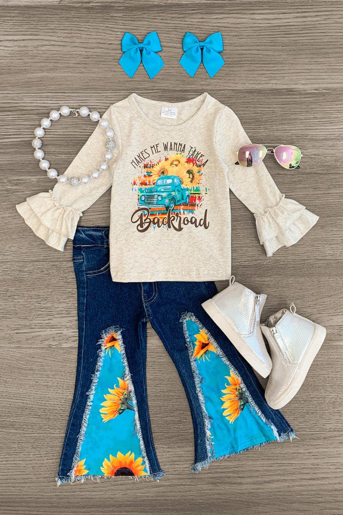 "Makes Me Wanna Take A Backroad" Denim Set - XXS-12-18 Months - Cream long-sleeve top with floral bell sleeves and truck graphic, paired with denim bell-bottom jeans with sunflower.