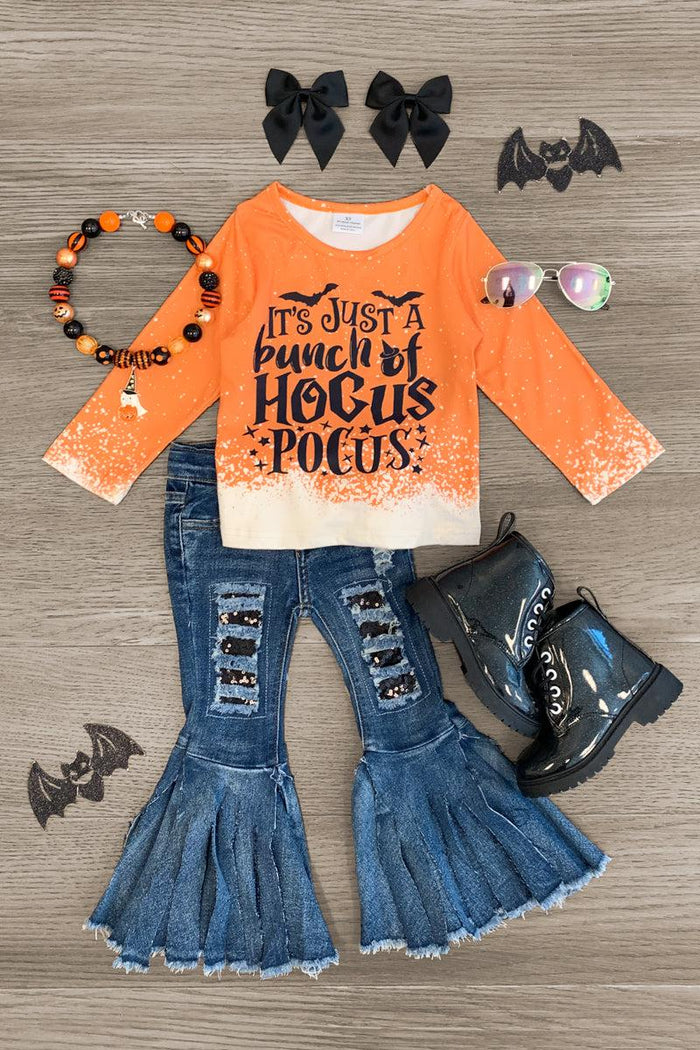 "It's Just A Bunch Of Hocus Pocus" Orange Denim Bell Bottom Set - 3XS-6-12 Months - Kids orange denim bell bottom set with "It's Just A Bunch Of Hocus Pocus" text, ruffled cuffs, black boots, black bow clips, .